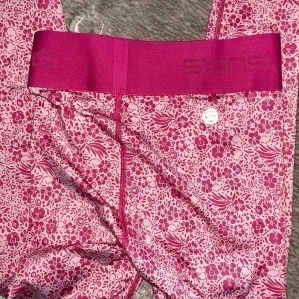 SKINS Pro Performance DNAmic Primary Compression Tights Floral gently preloved - Picture 7 of 14